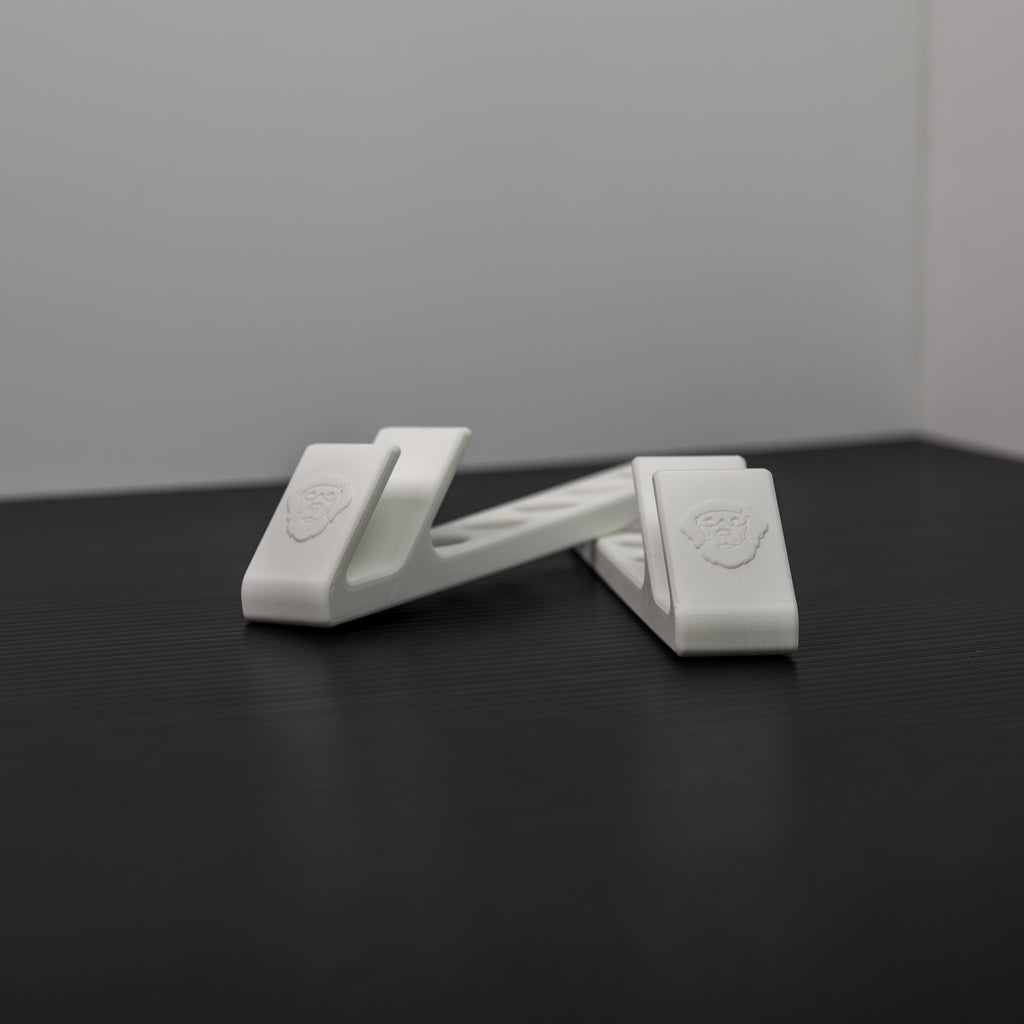 Two-piece 3D printed laptop stand showing flexible positioning