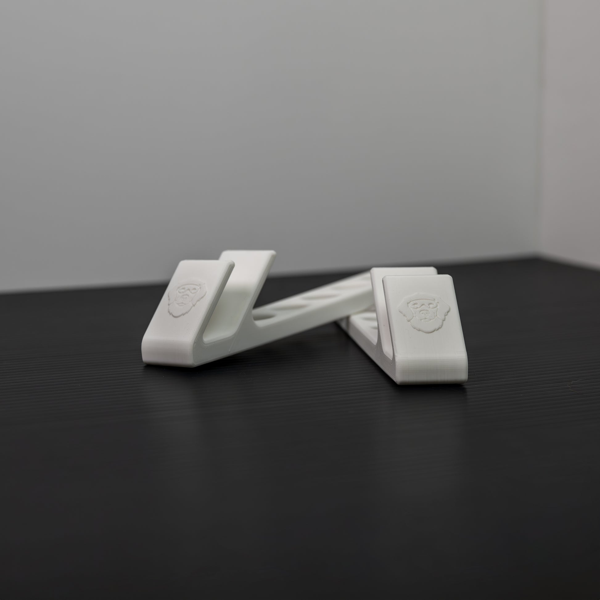 Two-piece 3D printed laptop stand showing flexible positioning