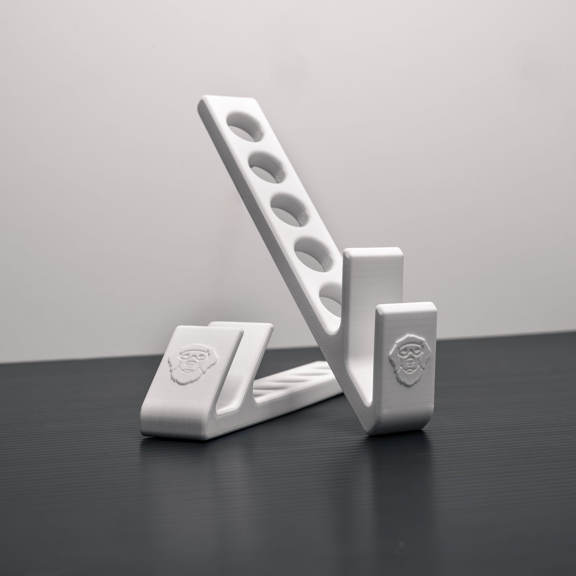 Two-piece 3D printed laptop stand showing flexible positioning