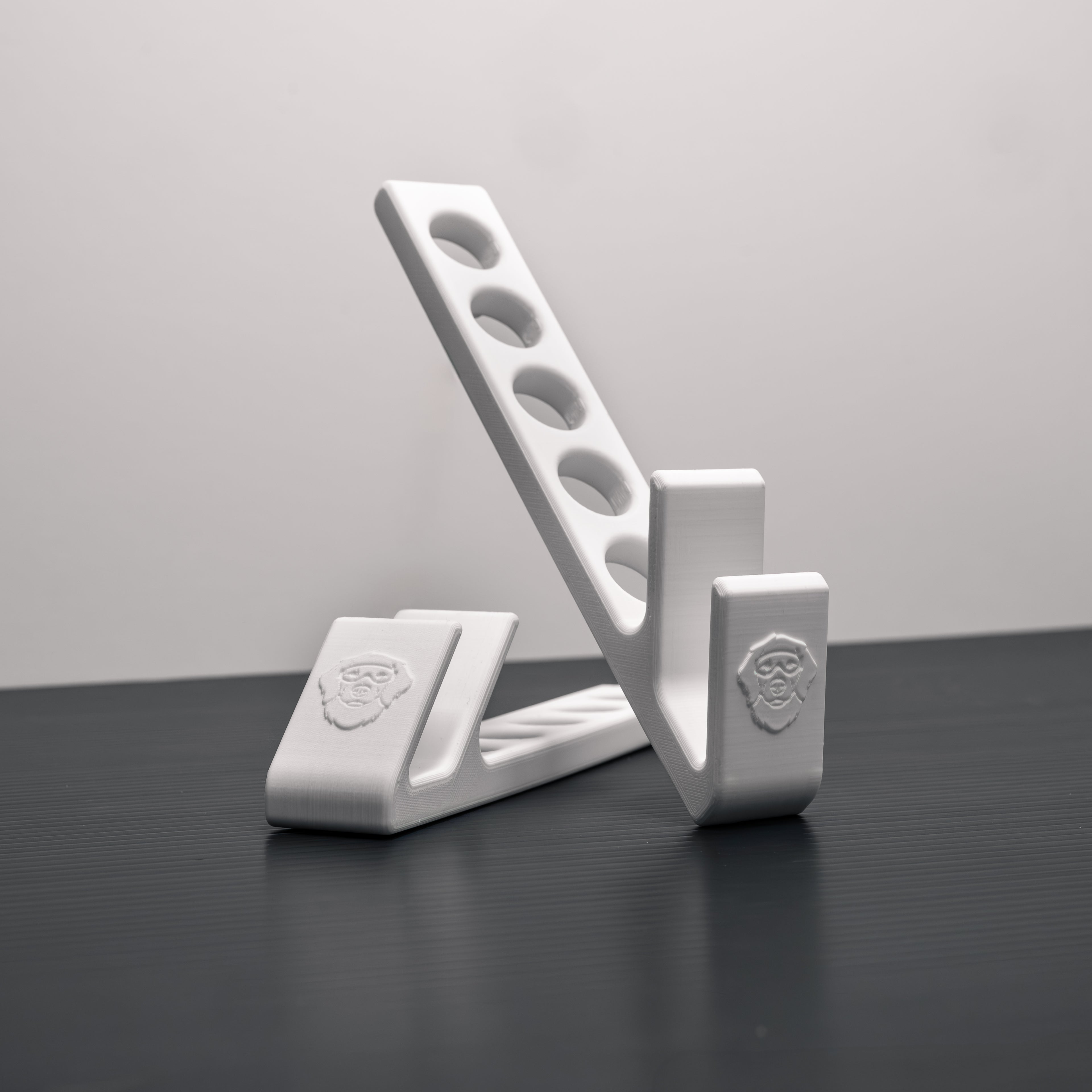 Two-piece 3D printed laptop stand showing flexible positioning