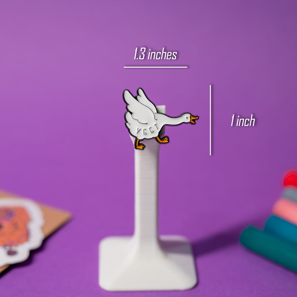Yeet Goose enamel pin with size reference, part of Untitled Goose pin series.