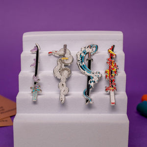 Set of Demon Slayer enamel pins featuring swords with Water, Flame, Serpent, and Insect Breathing styles.