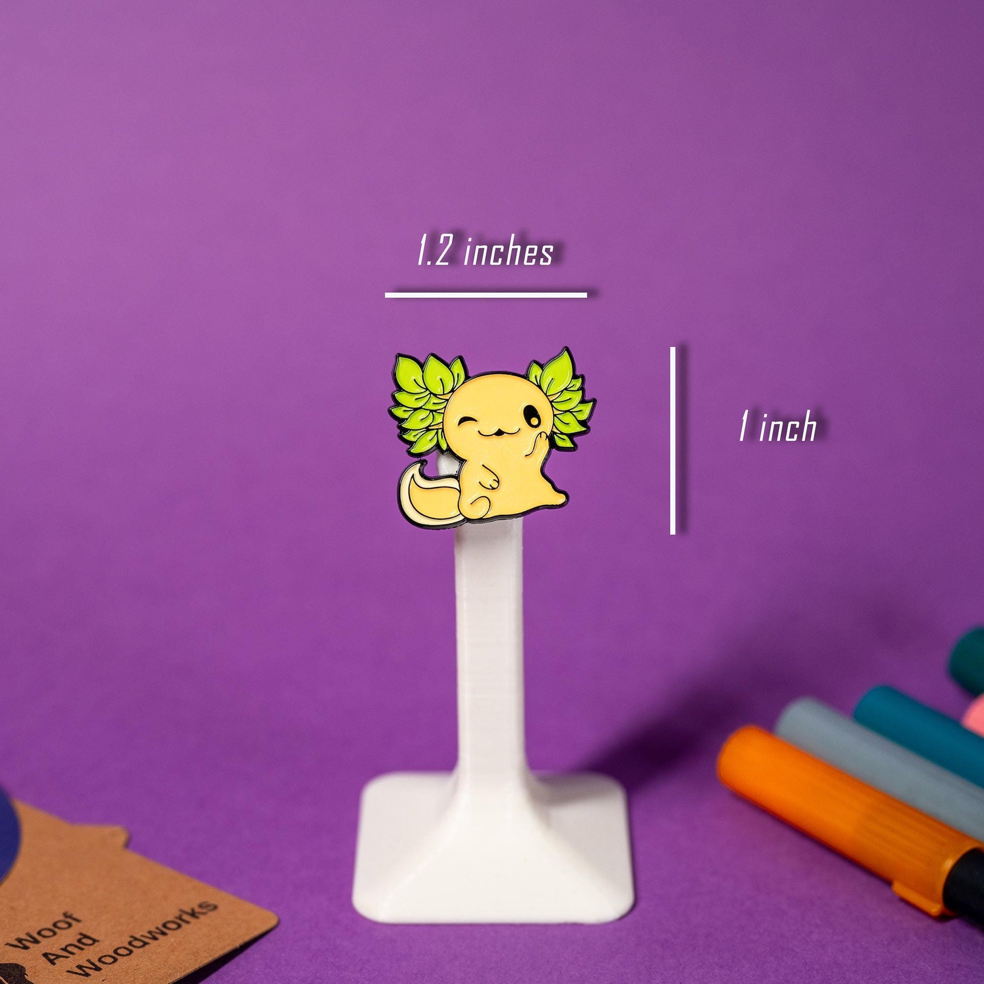 Enamel pin featuring an axolotl, often called a Mexican salamander in a kawaii design.
