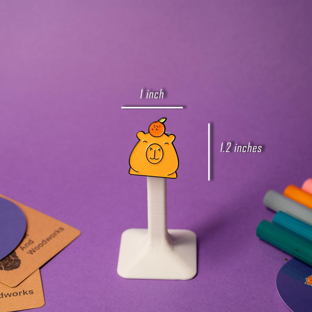Close-up of the No Text Capybara enamel pin, featuring a simple and adorable capybara design with a smooth enamel finish.
