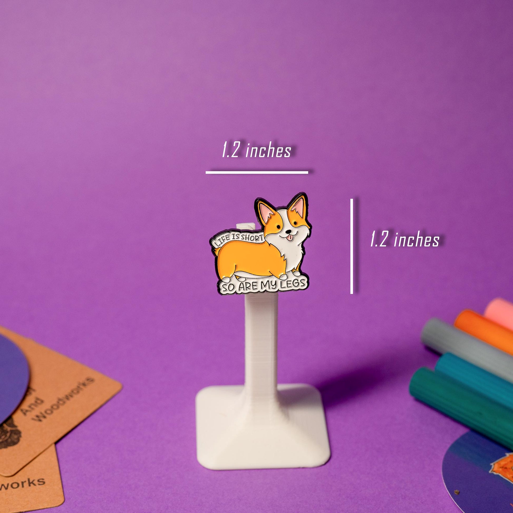 Funny enamel pin with a corgi and the phrase Life Is Short So Are My Legs.